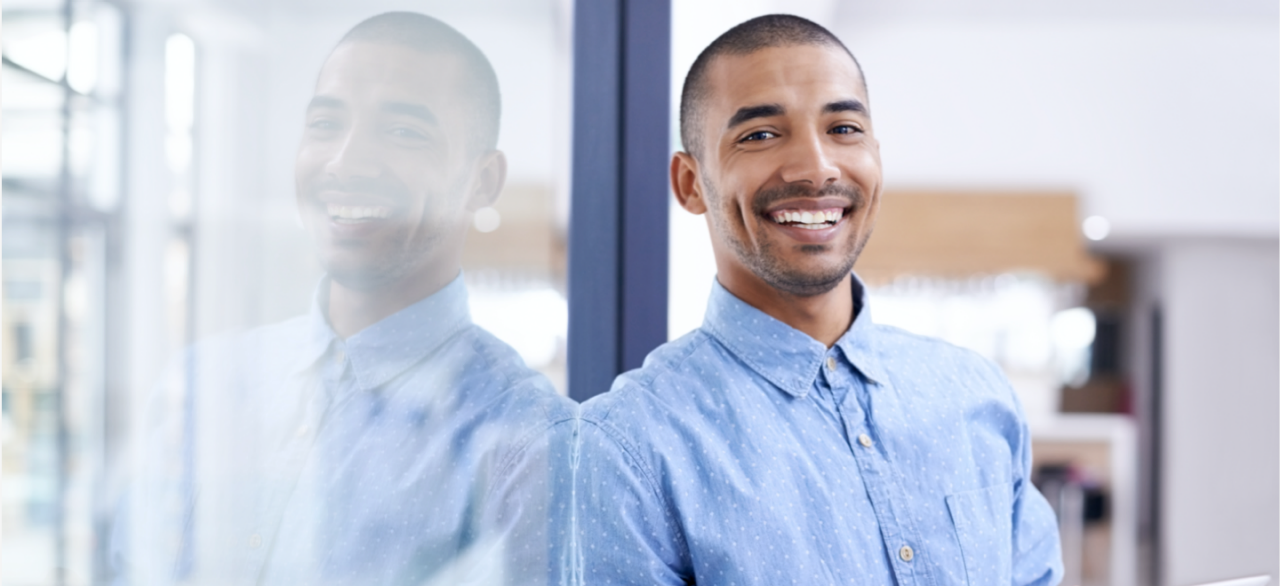 person smiling in office setting